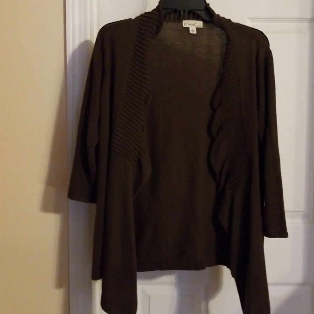 Brown cardigan.